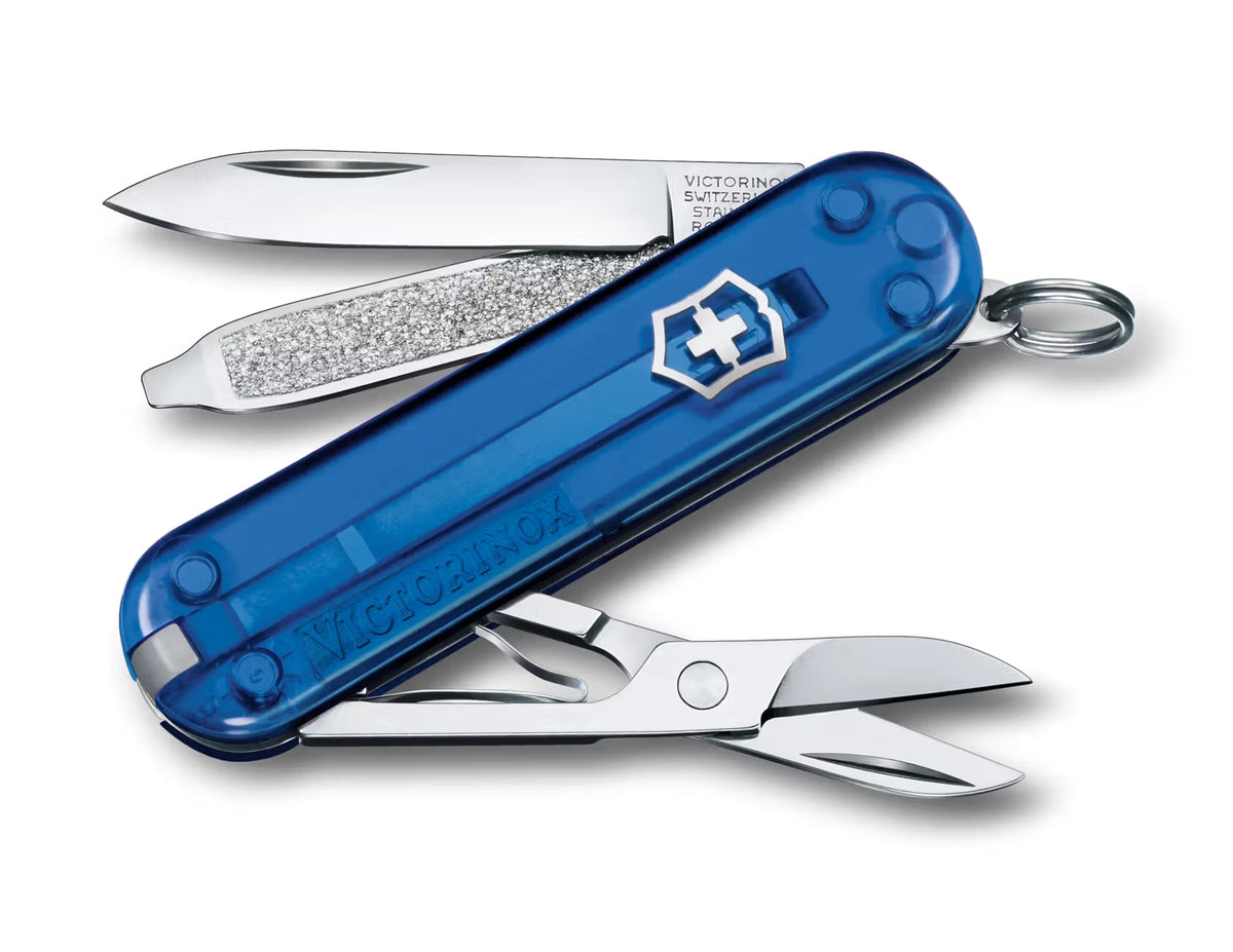 Blue Swiss Army knife with multiple tools on a white background