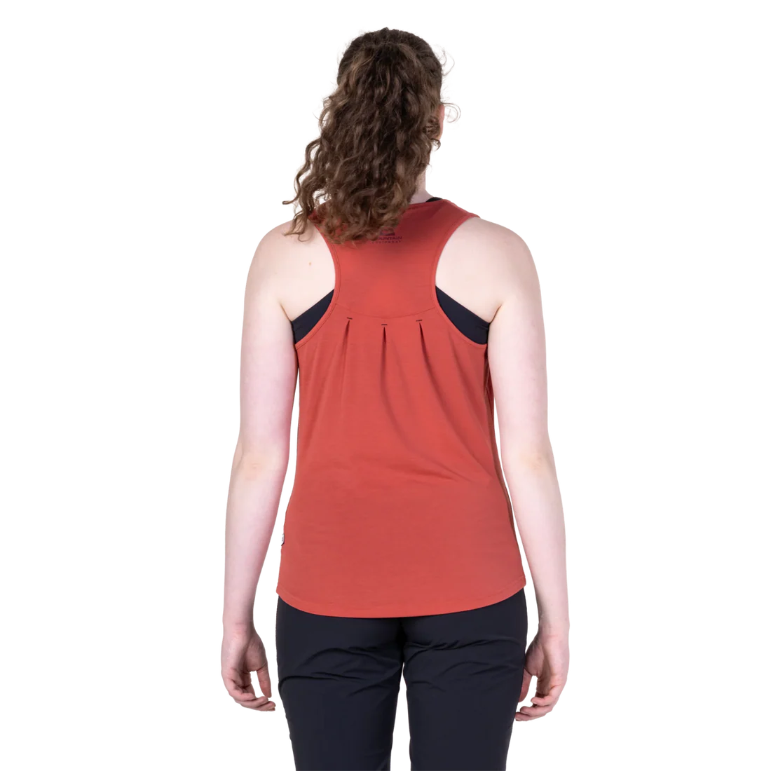 Mountain Equipment Equinox Women's Vest in Rosewood - On Model Walking Back