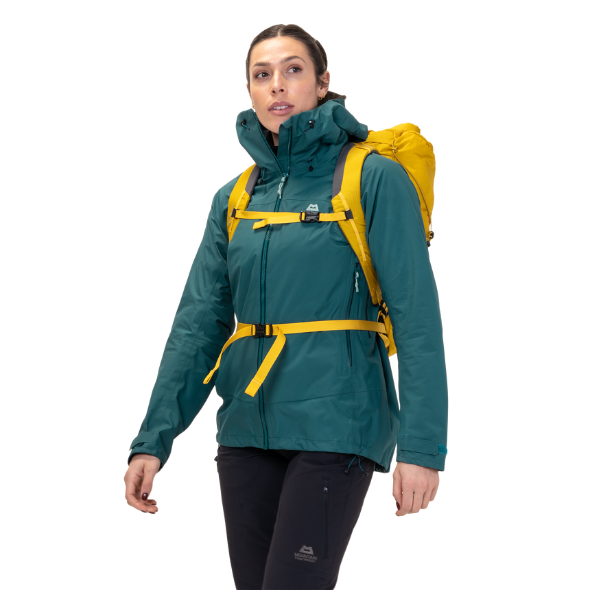Mountain Equipment Odyssey Women's Jacket in Deep Teal - On Model With Pack