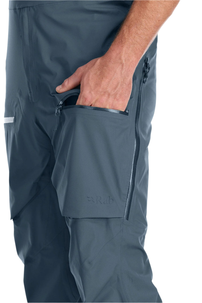 Rab Men's Khroma Kinetic Waterproof Bib Pants in Orion Blue - hip pocket detail