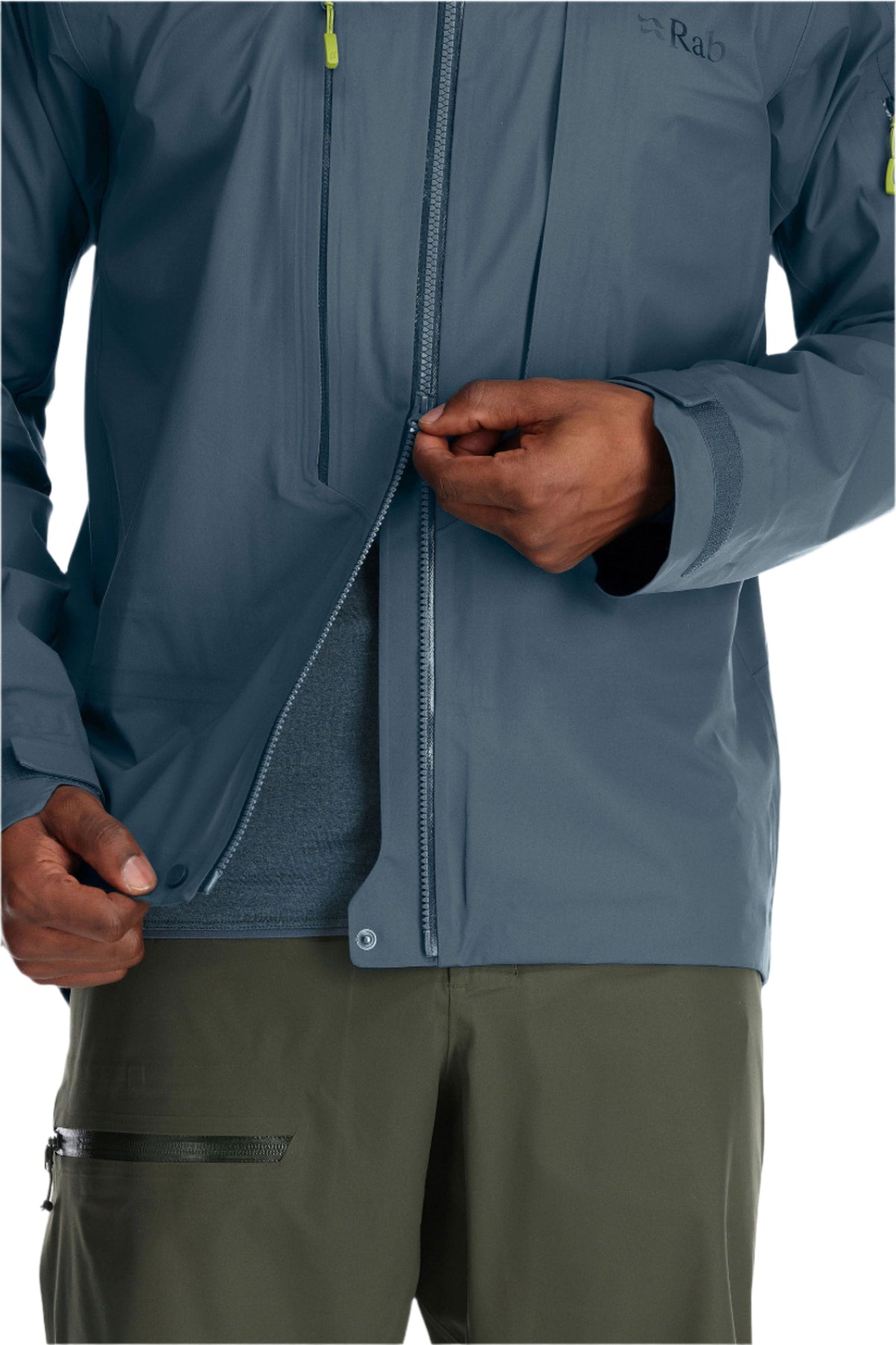 Rab Men's Khroma Kinetic Waterproof Ski Jacket in Orion Blue - front zip detail, worn