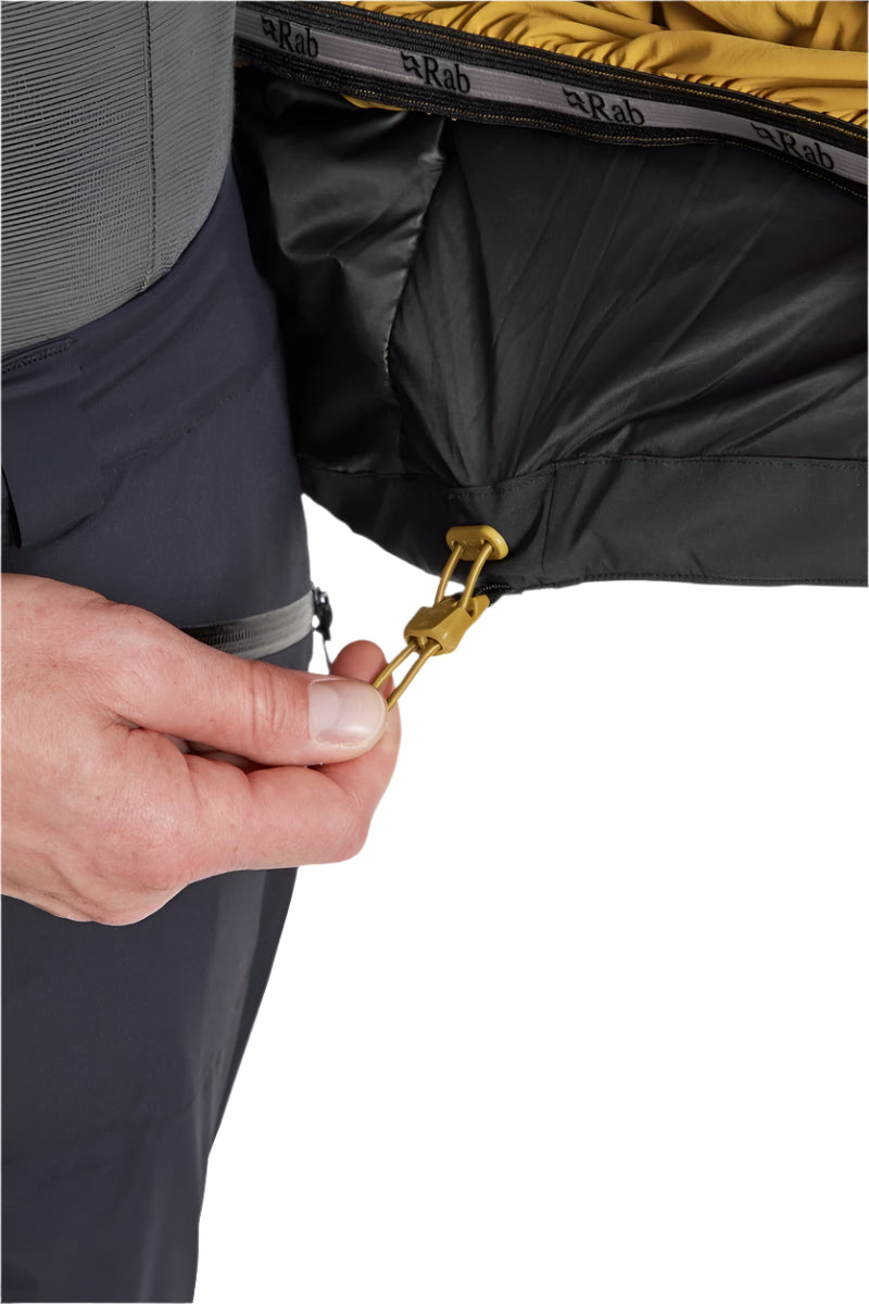 Rab Men's Khroma Diffract Insulated Ski Jacket in Footprint/Black - powder skirt detail