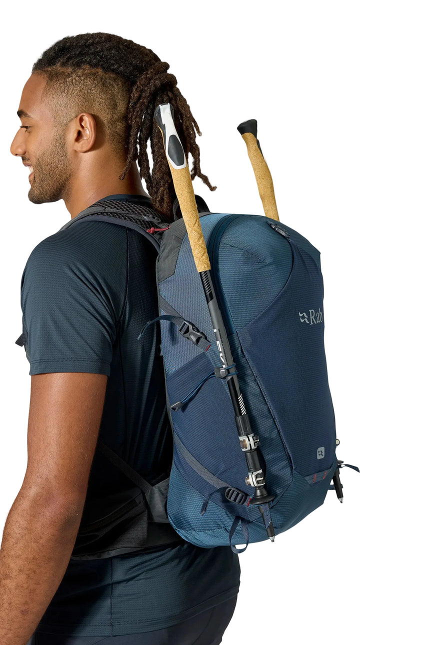 Rab Protium 20L Day Pack in Tempest Blue - On Model Side View with Ice Axe