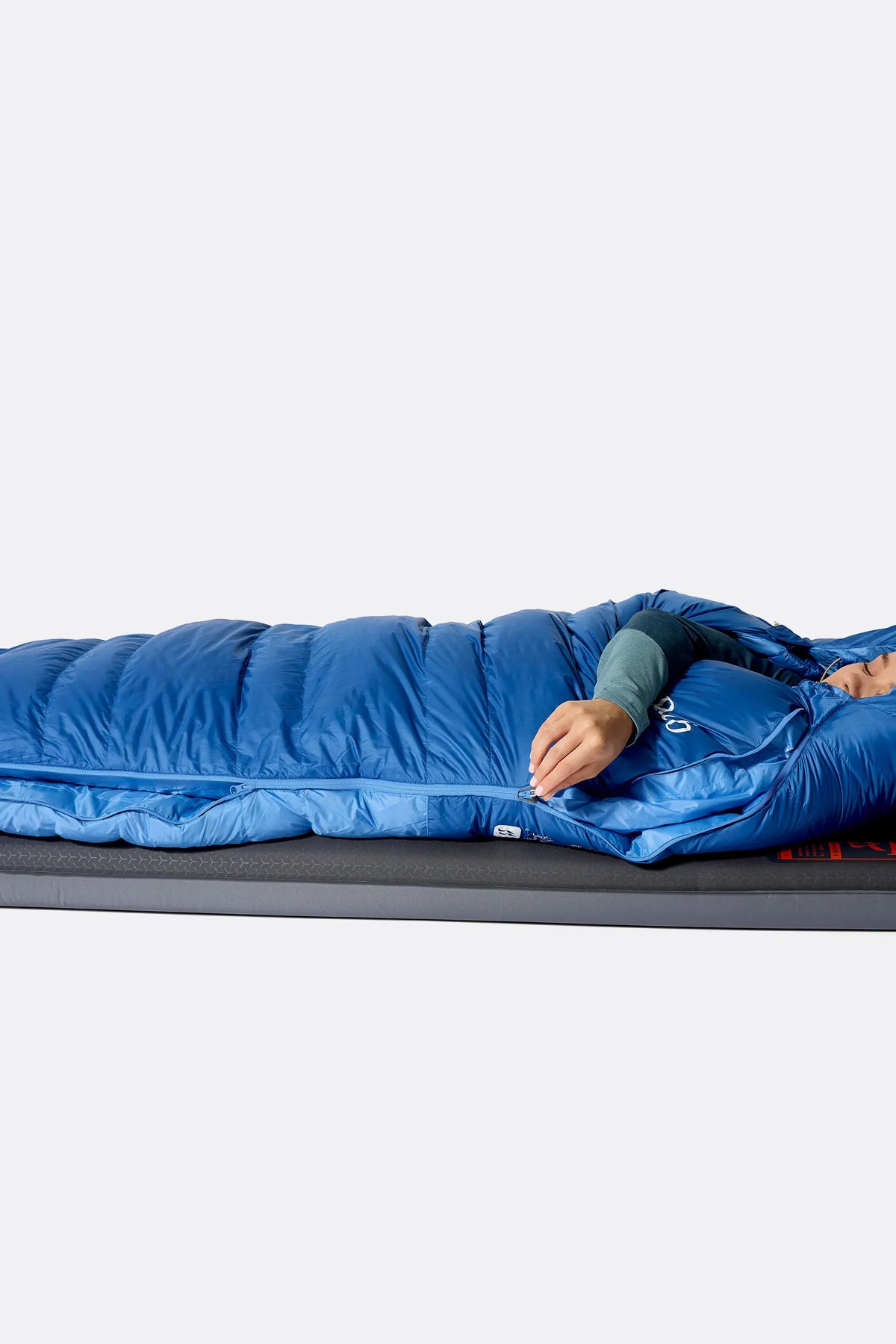 Rab Women's Ascent Down Sleeping Bag (-6°C/20F) in Dark Bluebird/Bluebird - Model Seated Hood
