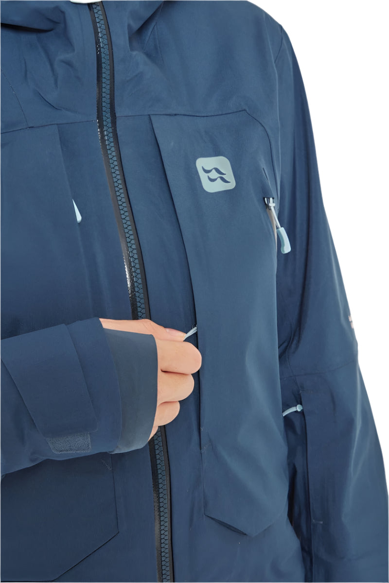 Rab Women's Khroma Converge GORE-TEX Ski Jacket in Tempest Blue - chest pocket detail, worn (reference only, not a stocked colour)