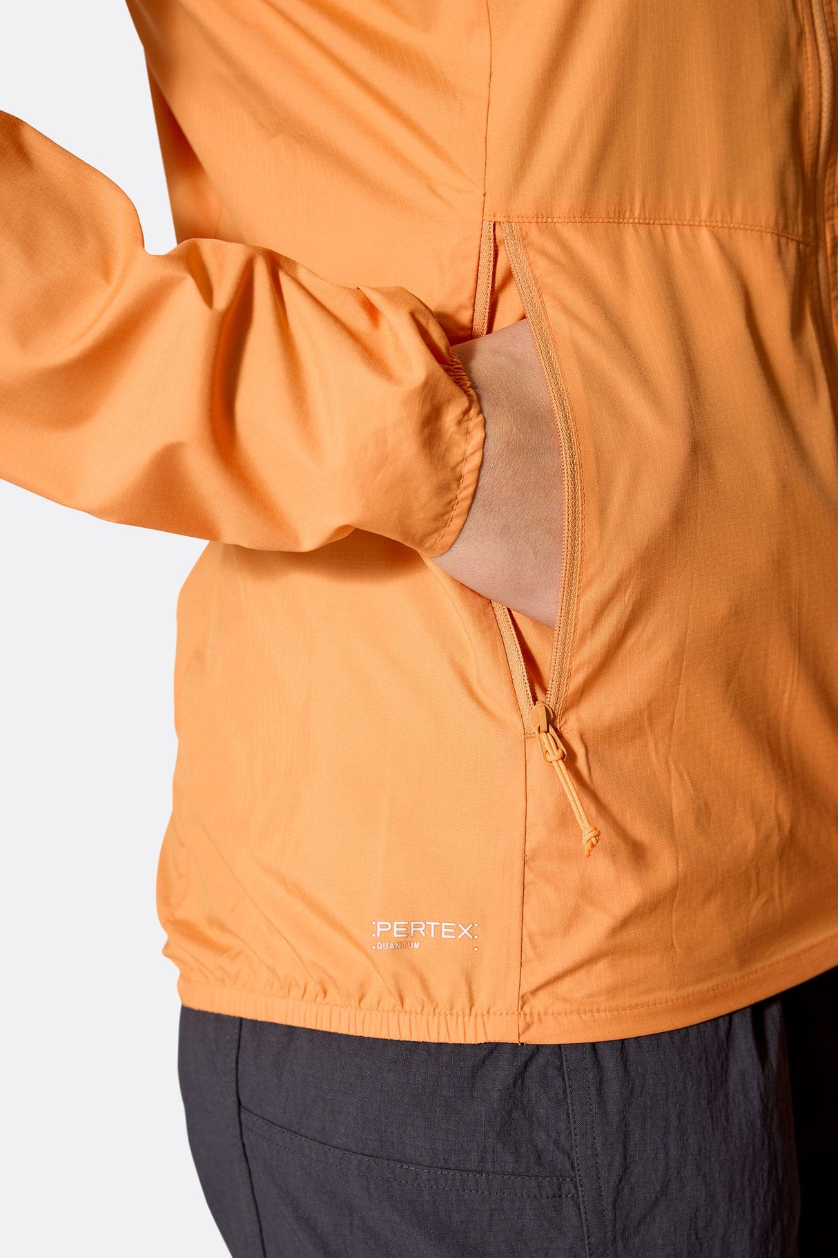 Rab Women's Windgather Hooded Jacket in Orange - pocket detail worn