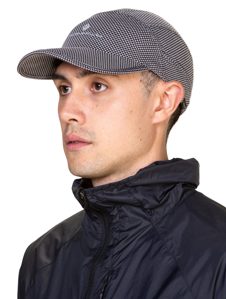 Ronhill Golden Hour Cap in Black Matrix - worn, front