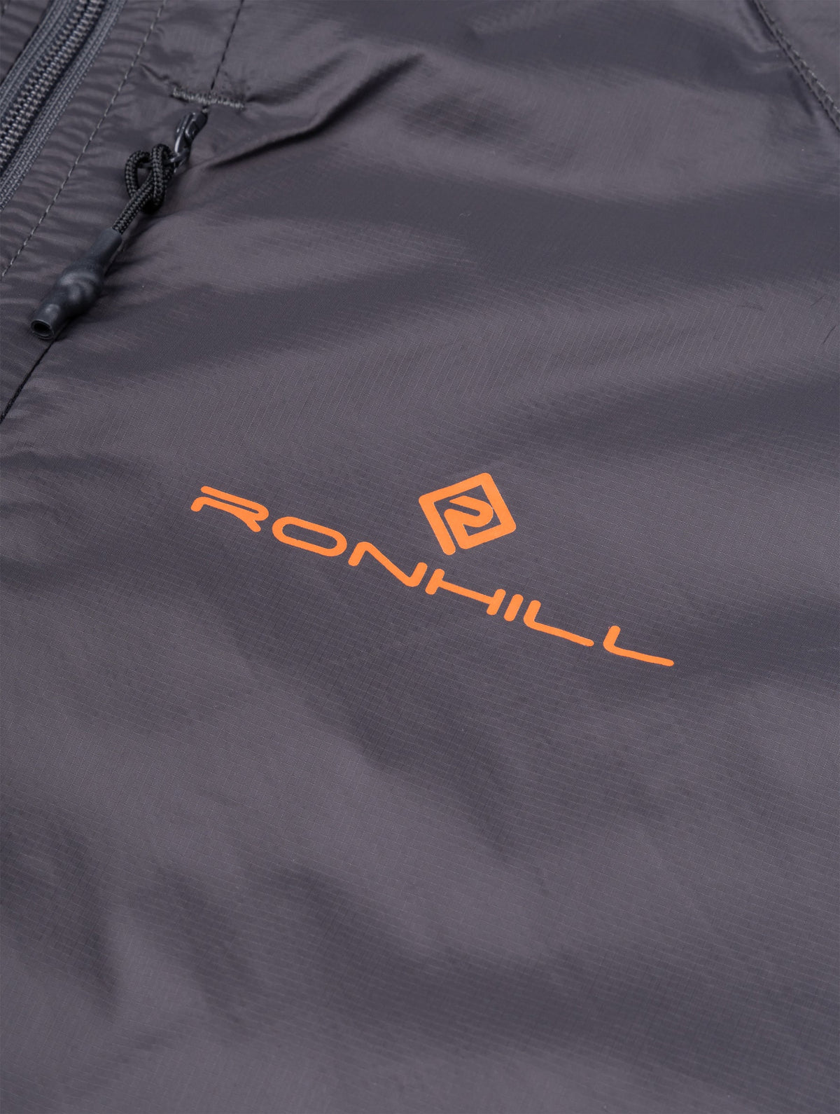 Ronhill Men's Tech All-Terrain Jacket in Oxide/Ronhill Red - logo detail