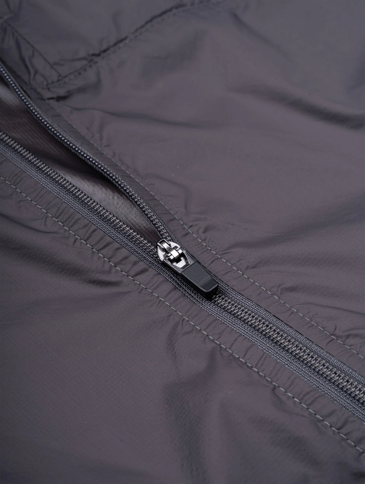 Ronhill Men's Tech All-Terrain Jacket in Oxide/Ronhill Red - zip pull detail