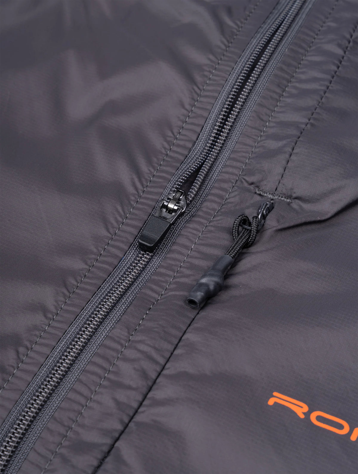 Ronhill Men's Tech All-Terrain Jacket in Oxide/Ronhill Red - zip pull detail