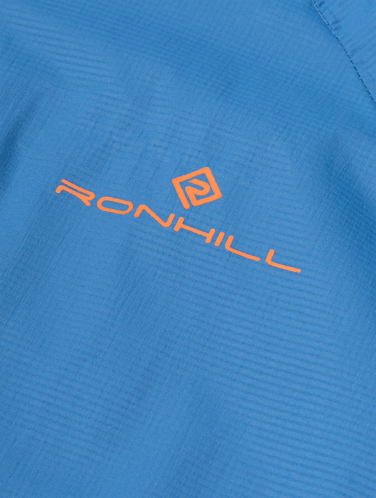 Ronhill Men's Tech Storm Jacket in Glacier/Ronhill Red - logo detail