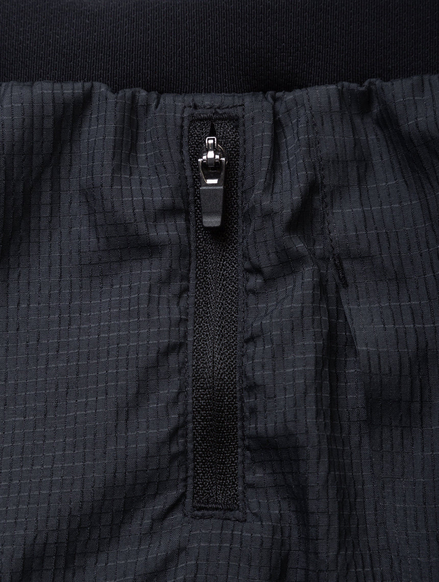 Ronhill Women's Tech Race Twin Short in All Black - side zip pocket detail