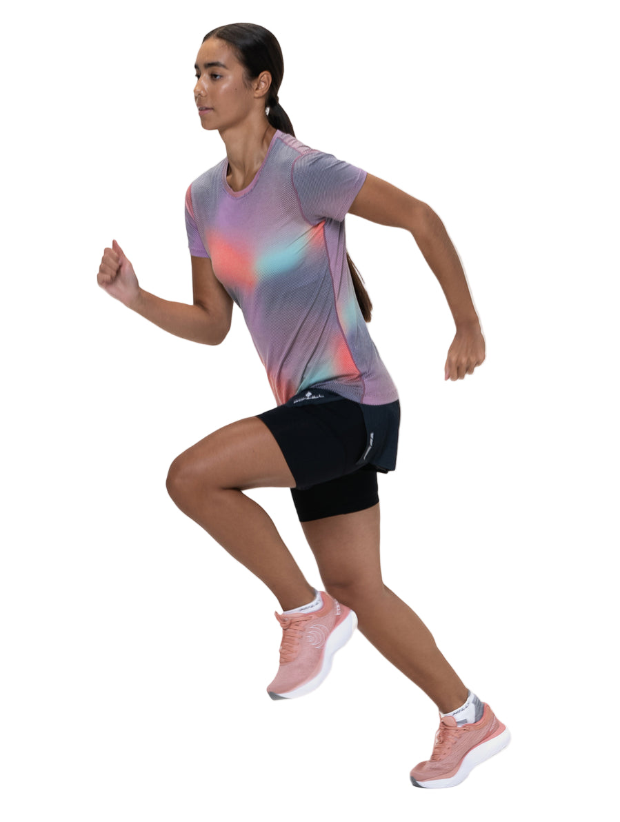 Ronhill Women's Tech Golden Hour S/S Tee Outdoor Action Multi Glow - Side Fit on Model