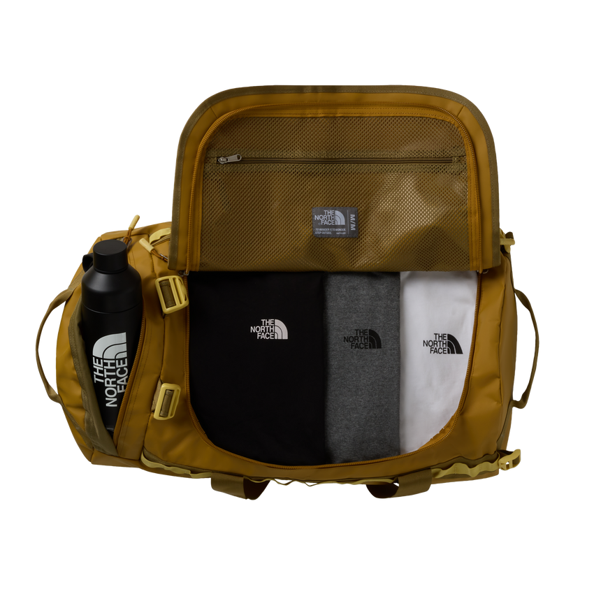 The North Face Base Camp Duffel Medium Golden Tan/Cedar - top view showing D-zip opening and compression straps