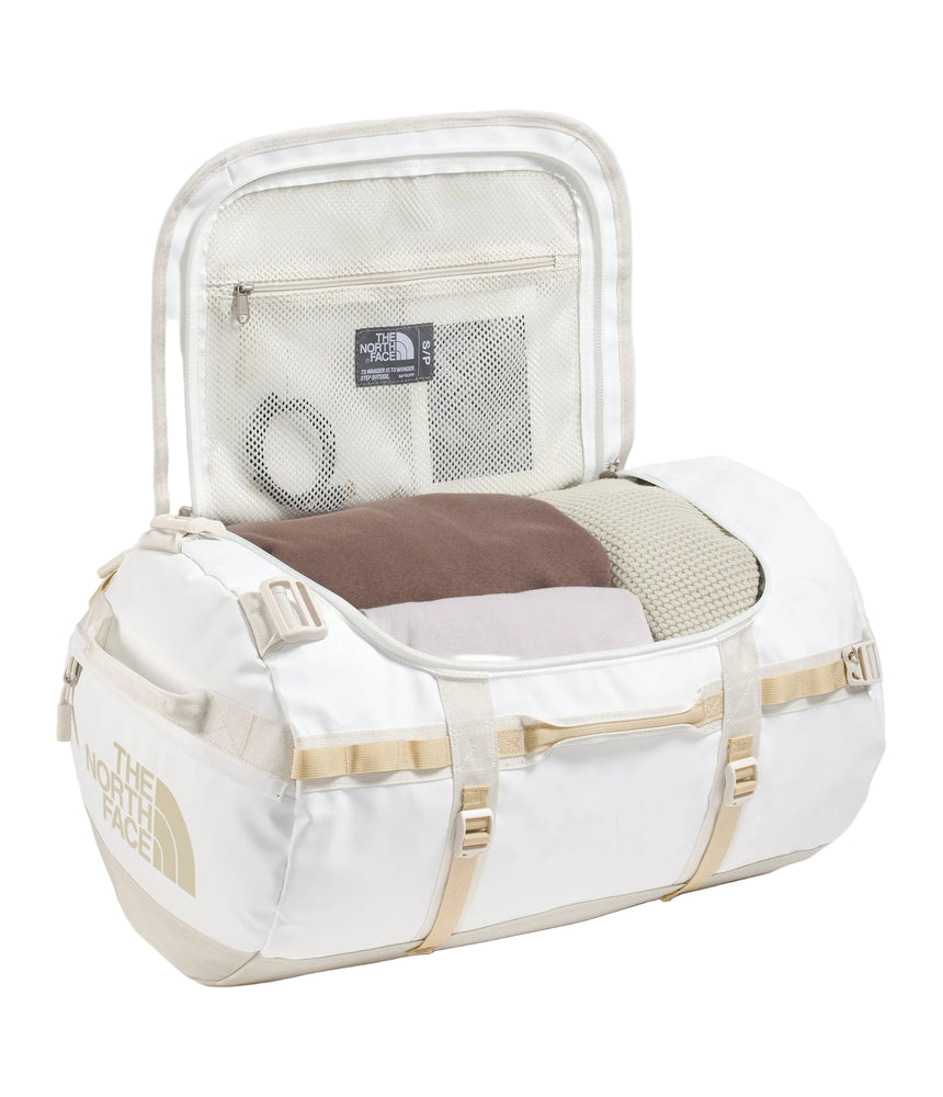 The North Face Base Camp Duffel Small White Ash/Calac - end-cap zippered compartment detail for wet clothes and gear separation