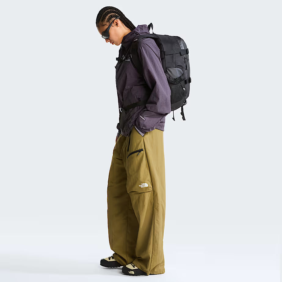 The North Face Hot Shot Base Camp Backpack in use showing bike-light loop and versatile everyday functionality