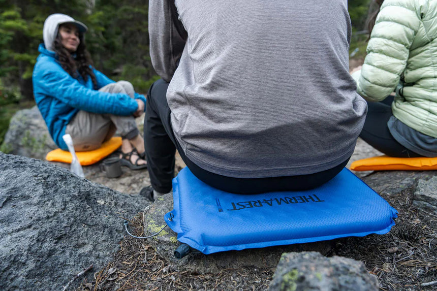 Thermarest Lite Seat Blue Outdoor Action- In use