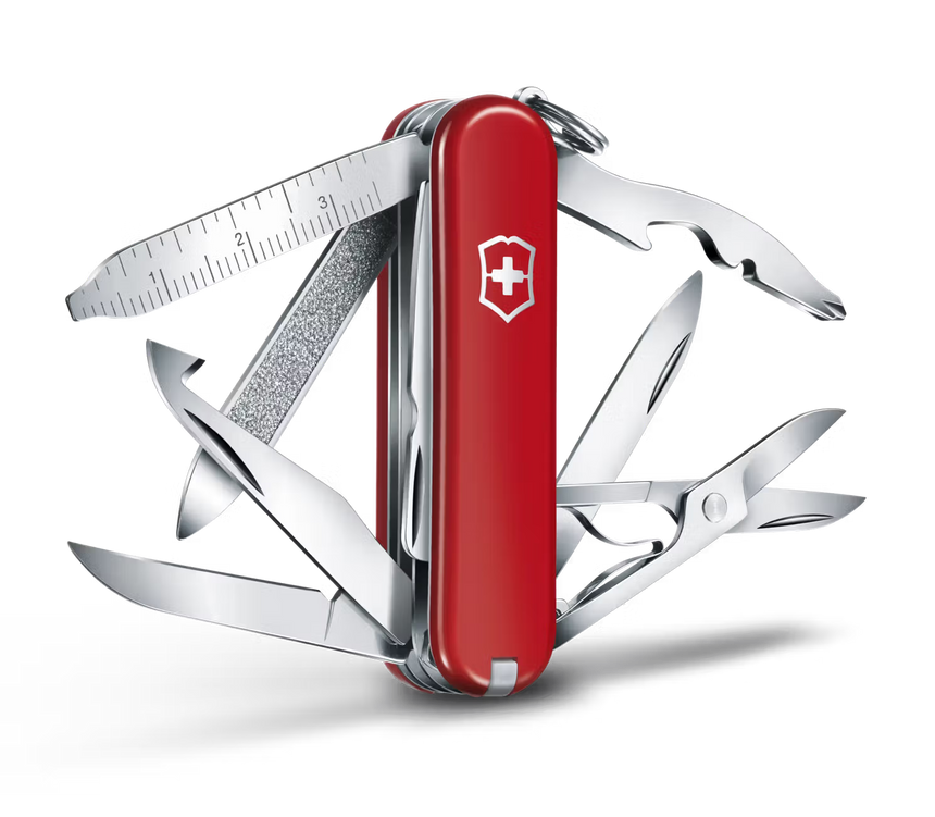 Red Swiss Army knife with multiple tools on a white background