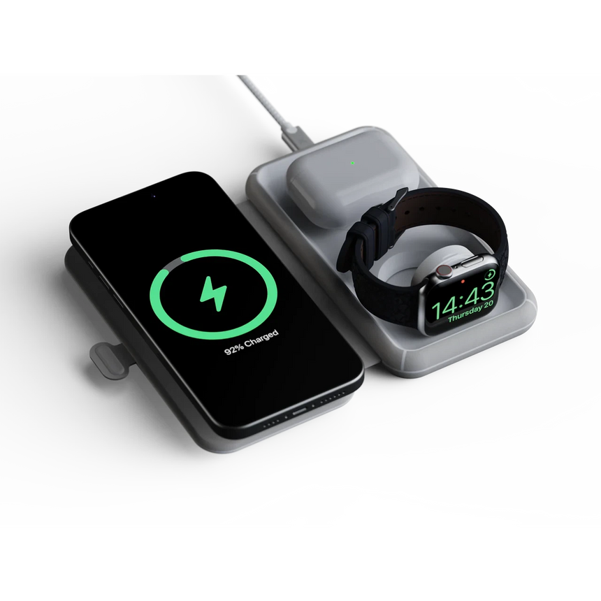 Xtorm Foldable Wireless Travel Charger 3-in-1 - Angled Top View with Phone, Watch & Earpods