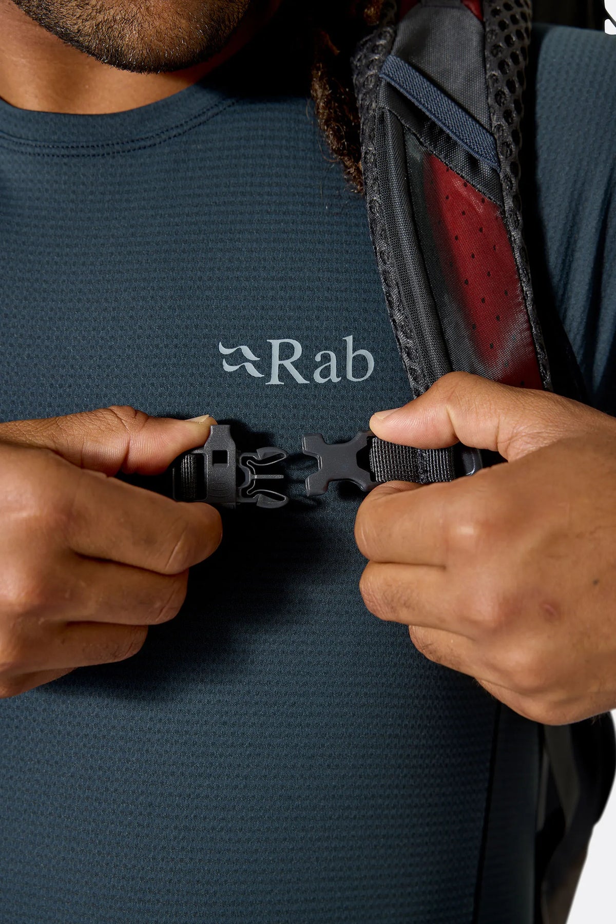 Rab Hyperon 65L Trekking Pack in Dark Pewter/Anthracite - sternum strap, worn