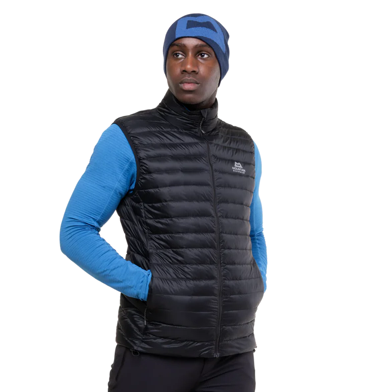 Mountain Equipment Frostline Men's Vest in Black worn on model - angled front view showing DRILITE Loft 20D shell and stitch-through narrow baffles