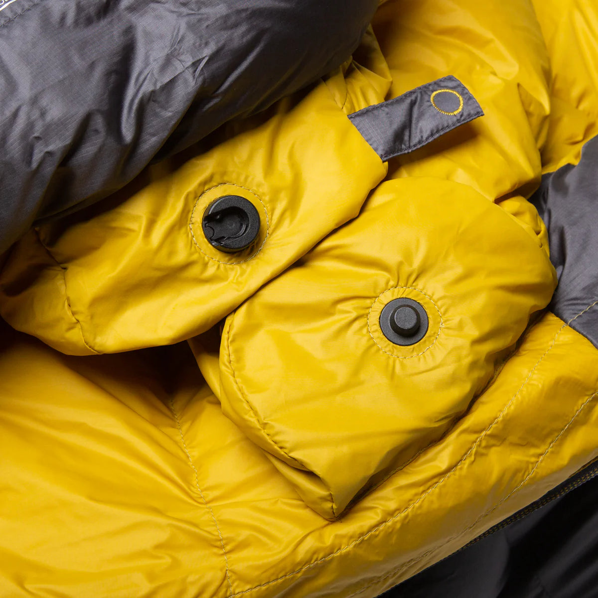 Gemini full-length 140 cm zip baffle detail on Mountain Equipment Helium GT 250 Sleeping Bag in Anvil Grey with Lode Lock magnetic closure