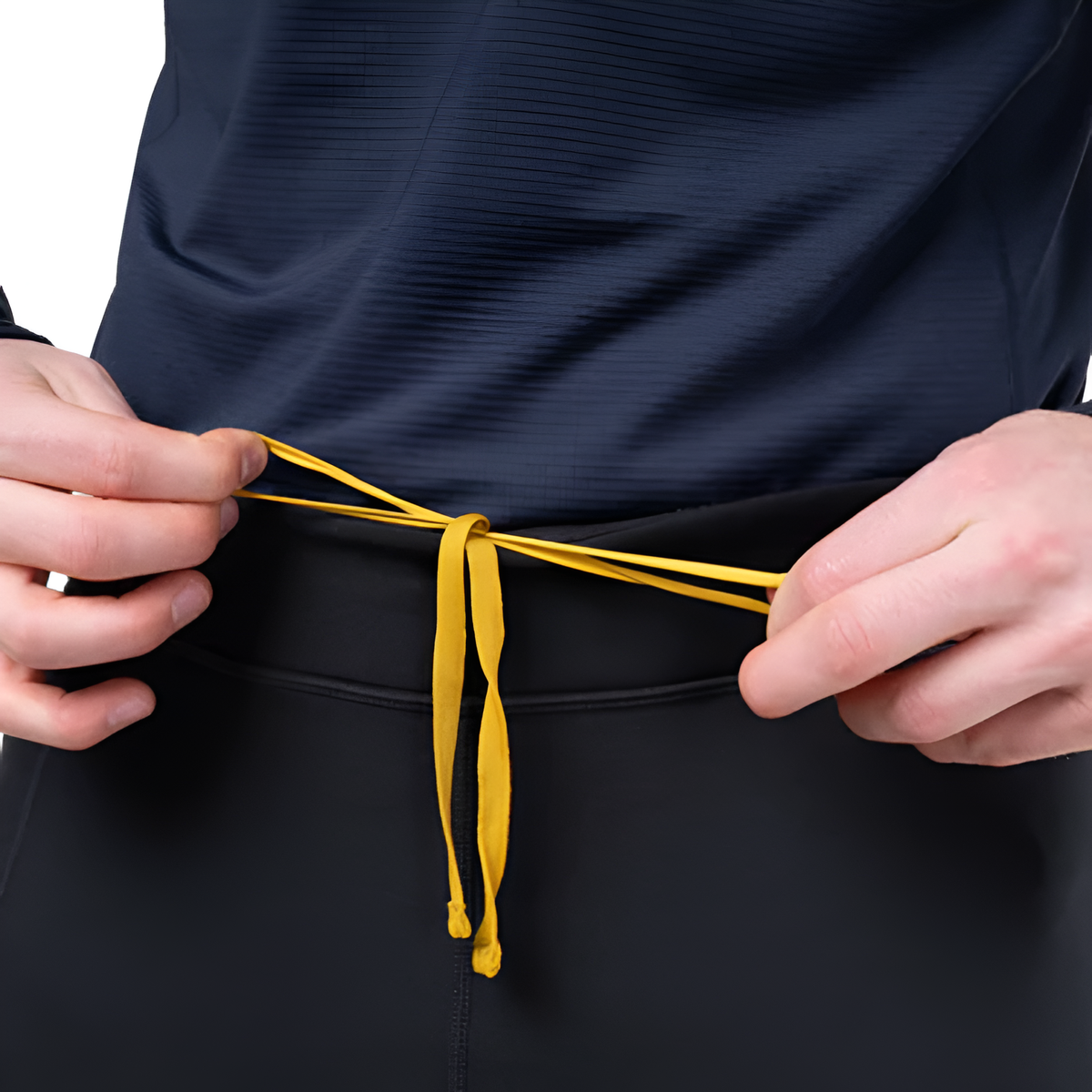 3/4 length hem detail on Mountain Equipment Jorasses Lite Men's 3/4 Tight in Black designed for use with ski boots