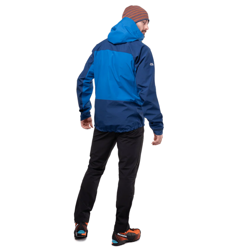 Mountain Equipment Saltoro GORE-TEX Men's Jacket in Atlantic/Admiral - back view showing dropped rear hem and articulated pre-shaped sleeves