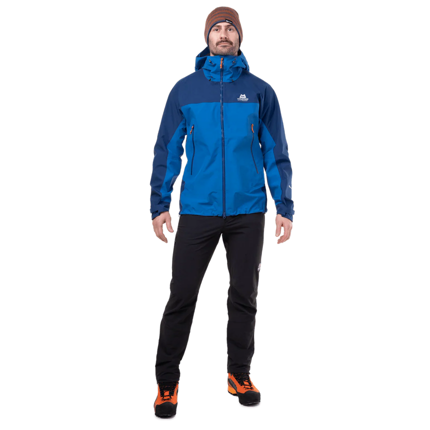 Mountain Equipment Saltoro GORE-TEX Men's Jacket in Atlantic/Admiral - lifestyle view showing waterproof shell for trekking and alpine mountaineering