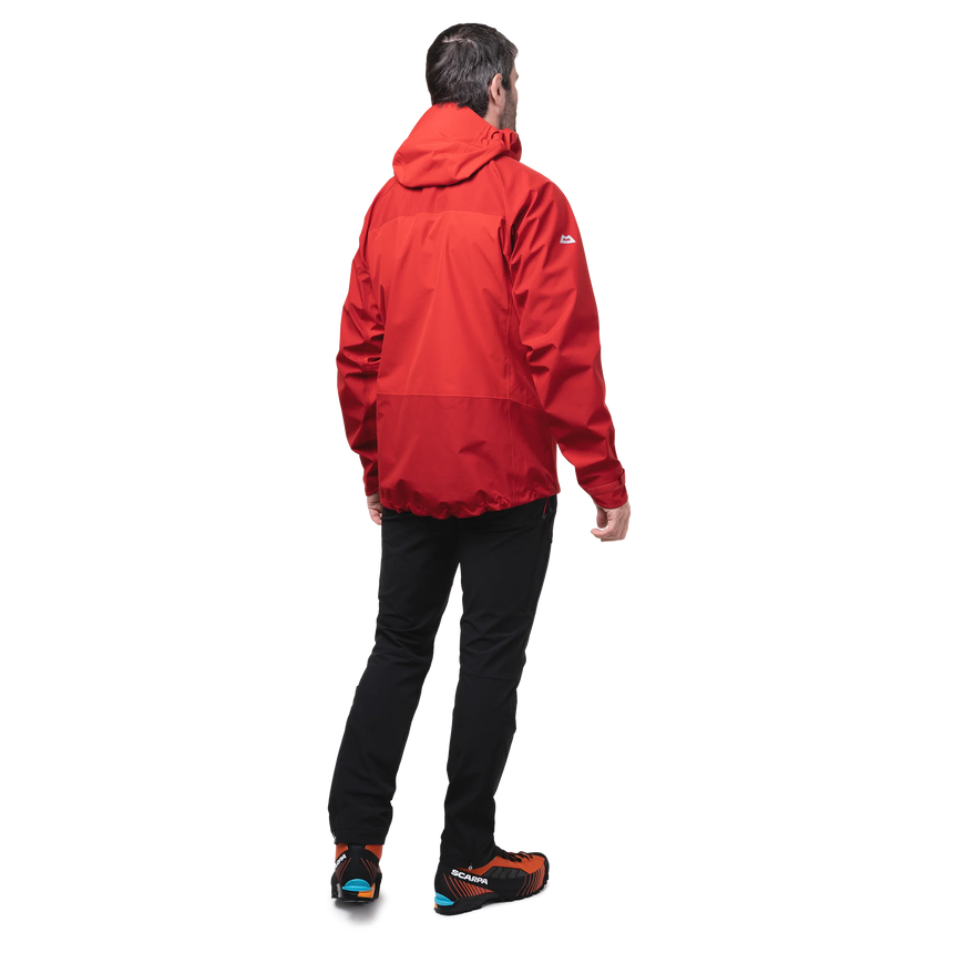 Mountain Equipment Saltoro GORE-TEX Men's Jacket in Imperial Red/Crimson - lifestyle view showing waterproof shell for trekking and alpine mountaineering