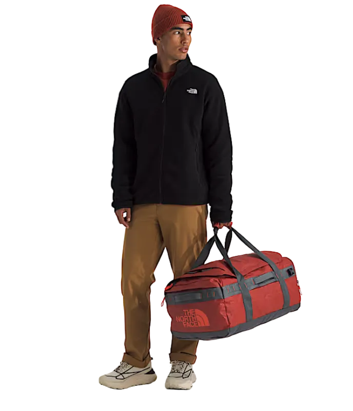 The North Face Base Camp Voyager Duffel 62L Iron Clay/Anthracite Grey/Lava Red - interior view showing laptop sleeve and secure-zip mesh organisation pockets
