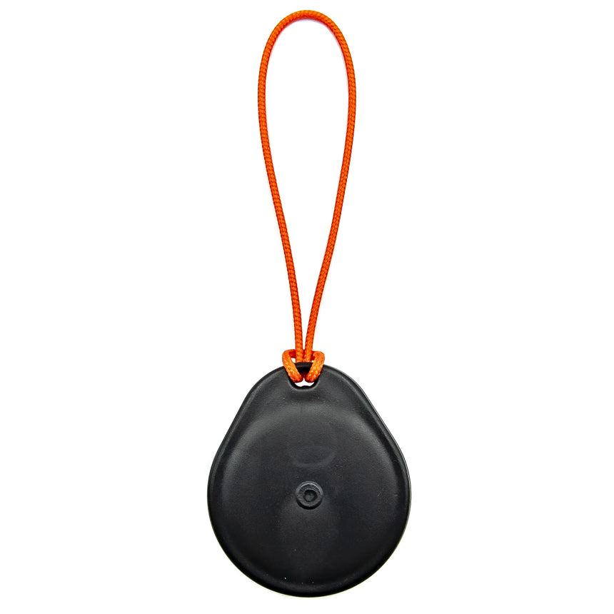 Black round object with an orange strap on a white background
