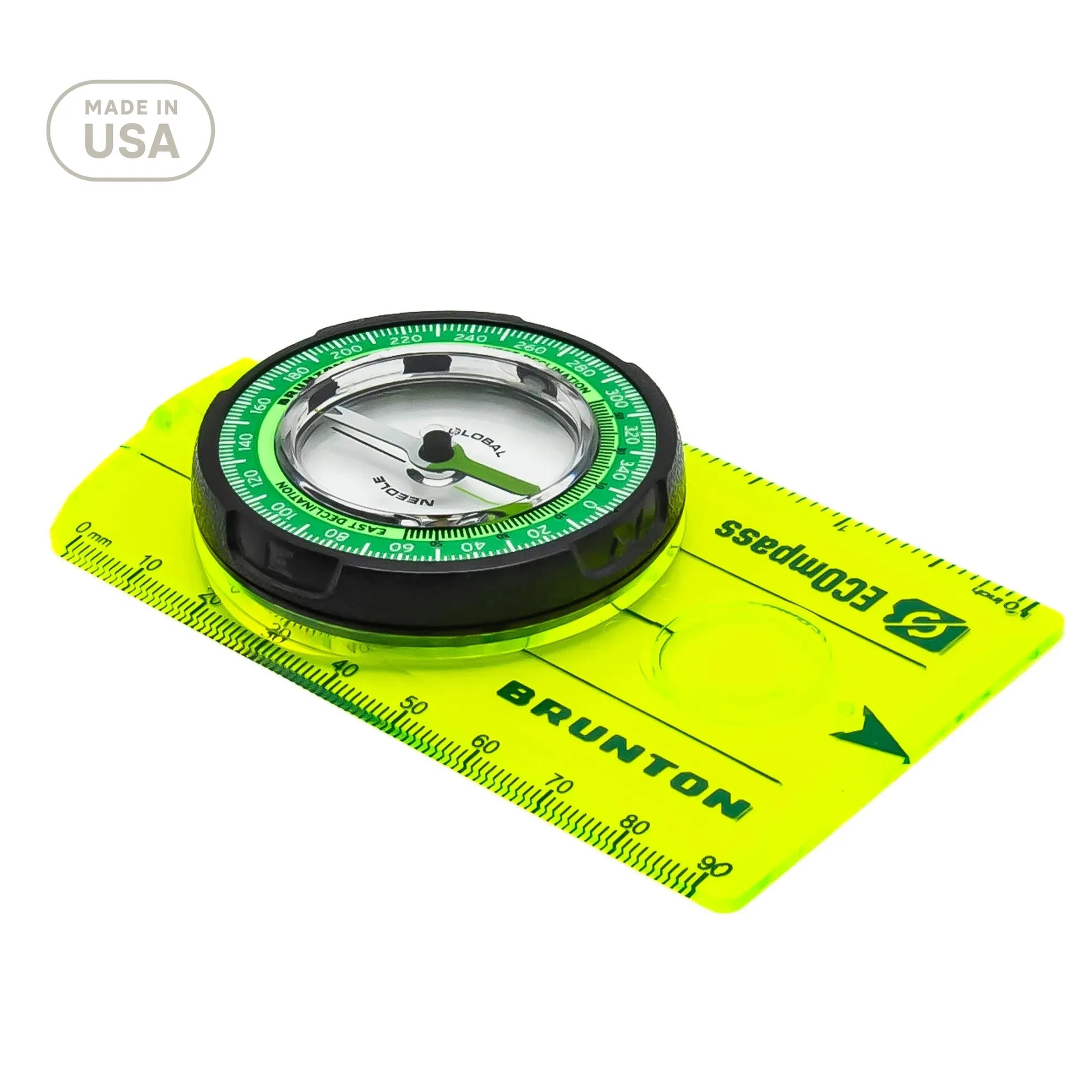 Brunton compass on a white background