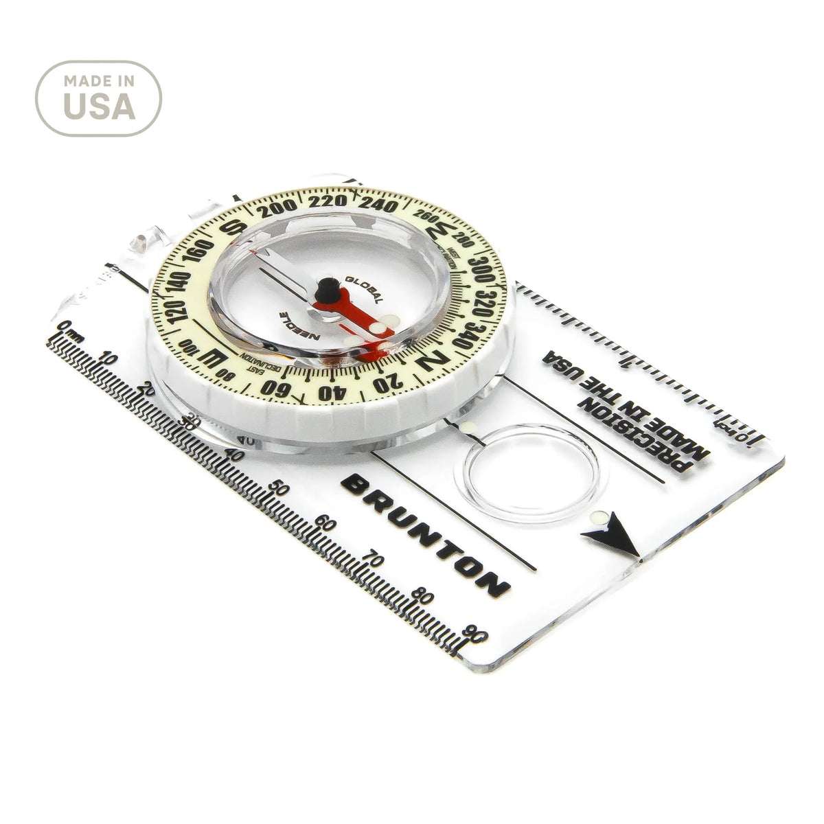 Brunton compass on a white background