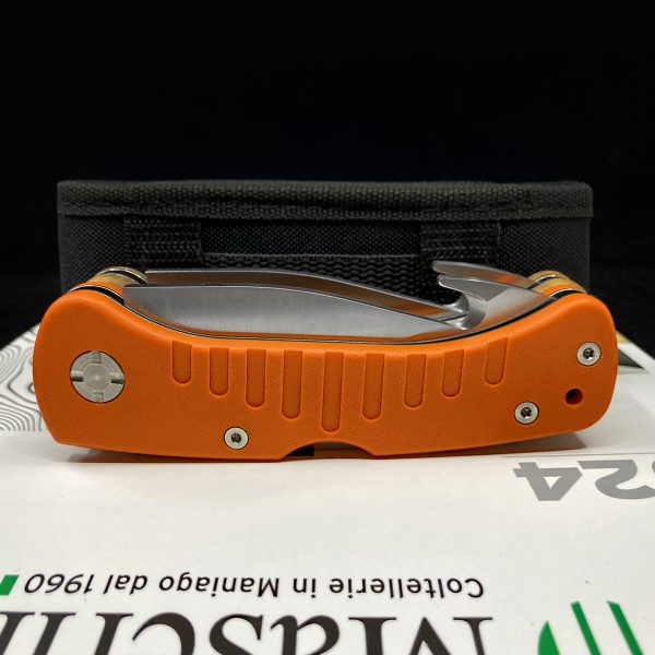 Close-up of Maserin 763 Skinner orange G10 handle - textured grip surface for secure handling