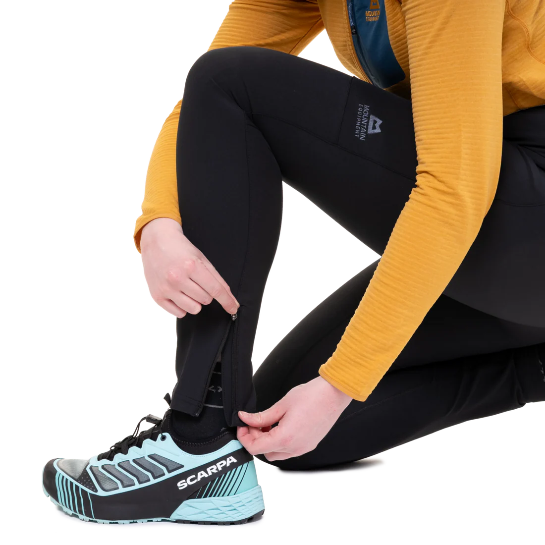 Mountain Equipment Austra Women's Tight in Black - Ankle Zip Detail
