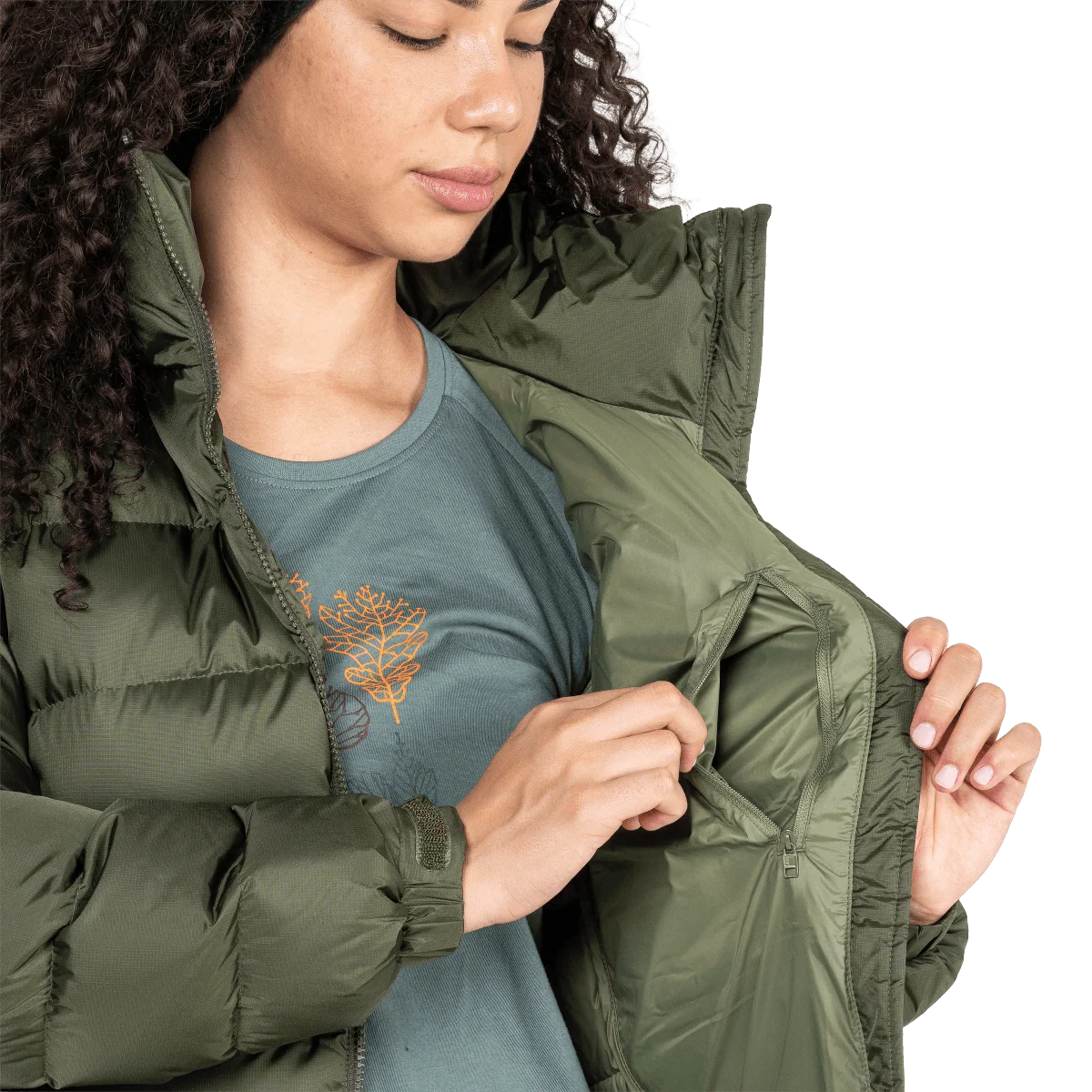 2-way YKK moulded centre front zip detail on model on Mountain Equipment Lightline Women's Jacket in Buckthorn