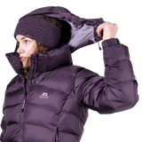 Zip-off Mountain Insulated Hood detail on model on Mountain Equipment Lightline Women's Jacket in Nightshade