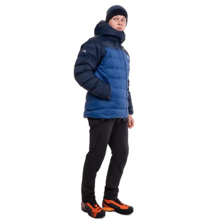 Mountain Equipment Senja Men's Down Jacket in Admiral/Cosmos - Front Angle Shot of Model with Hand in Pocket