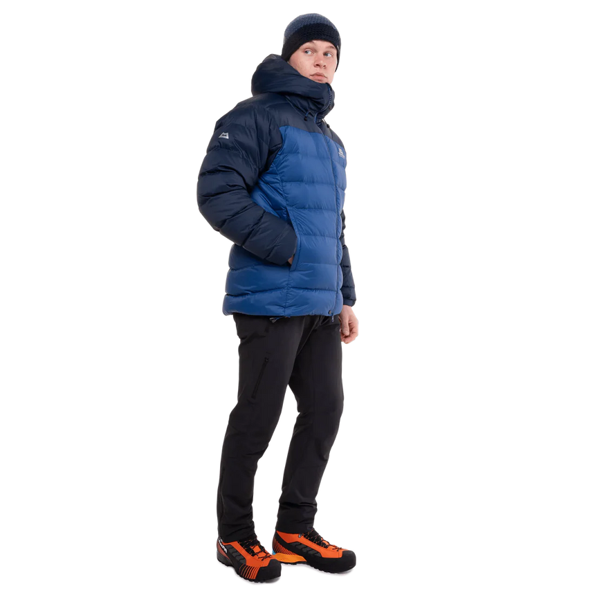 Mountain Equipment Senja Men's Down Jacket in Admiral/Cosmos - Front Angle Shot of Model with Hand in Pocket