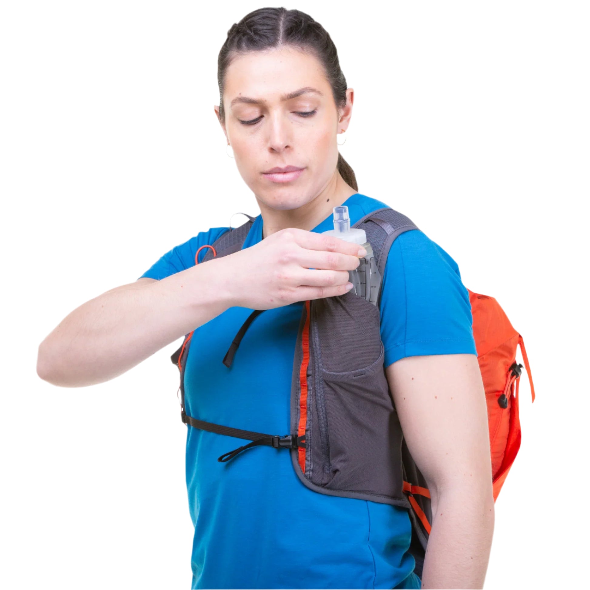 Mountain Equipment Tupilak 14 Vest Pack in Magma - Chest Pocket Detail on Model