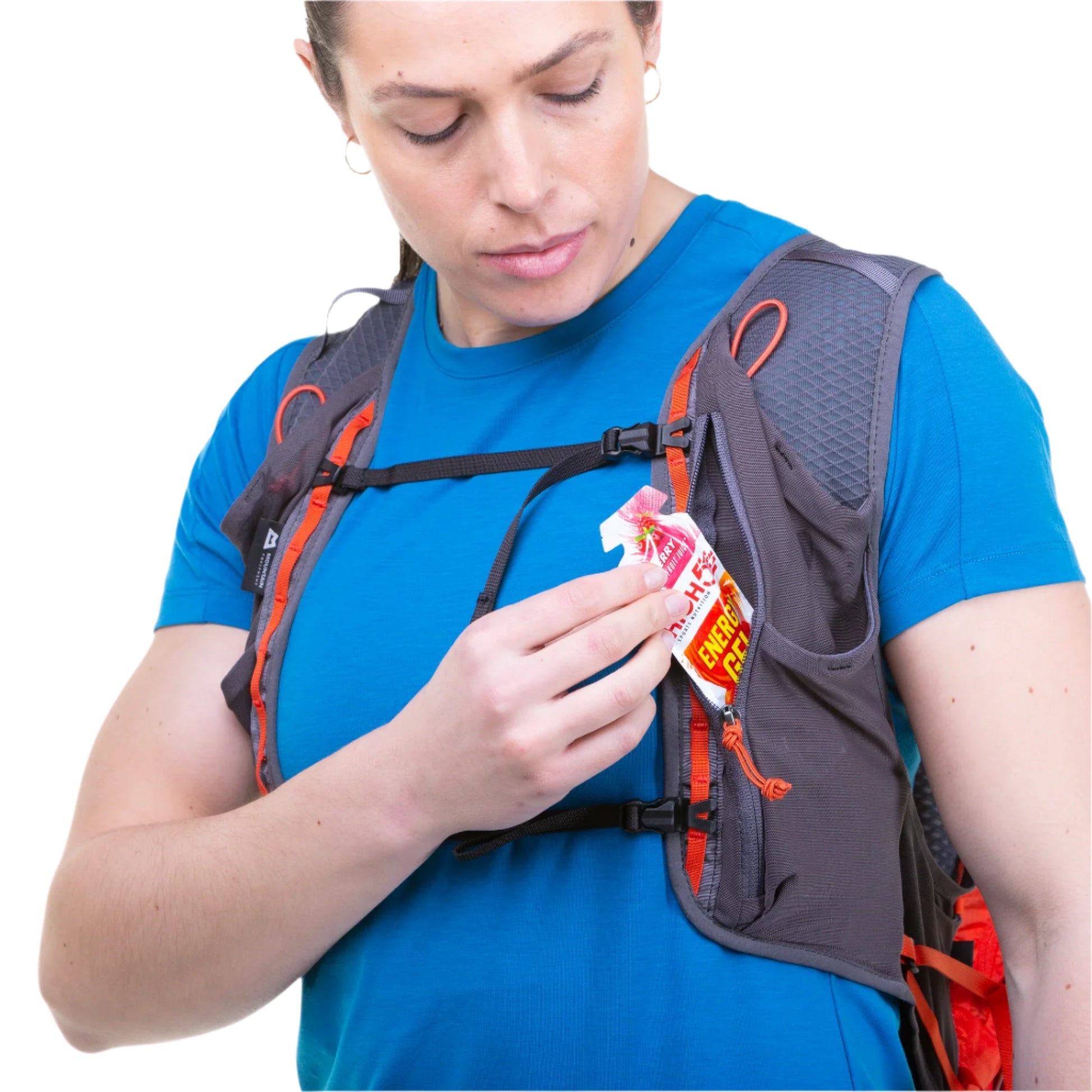 Mountain Equipment Tupilak 14 Vest Pack in Magma - Front Pocket Detail on Model