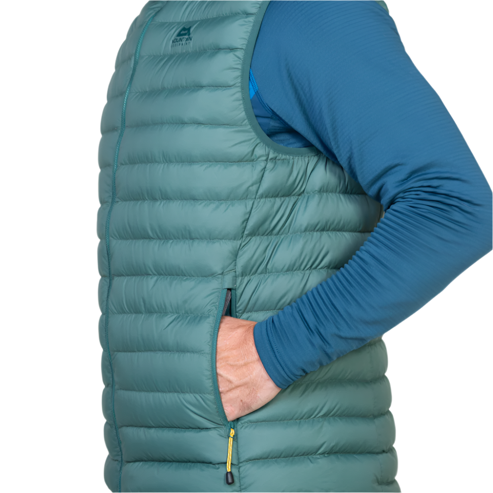 Zipped chest pocket detail on Mountain Equipment Earthrise Men's Vest in Fern