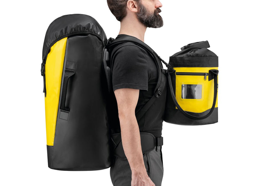 Petzl Transport 60 Backpack Black/Yellow - Model Carrying Large Pack & Smaller Pack