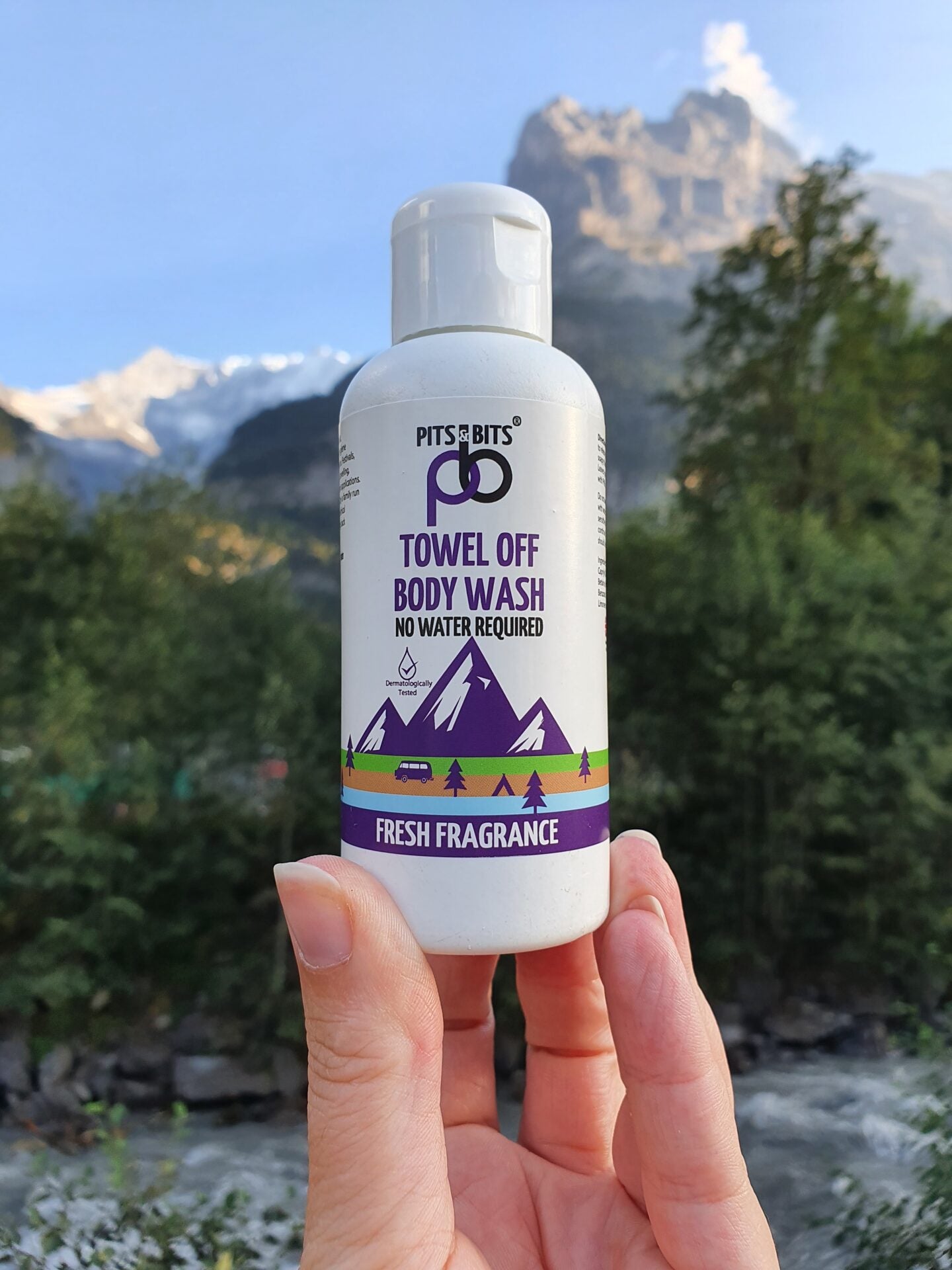 Pits & Bits® Towel Off Fresh Fragrance Body Wash 500ml - Model Holding 100ml Bottle