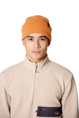 Rab Adzuki Beanie in Melba - front, styling reference