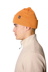 Rab Adzuki Beanie in Melba - side, styling reference