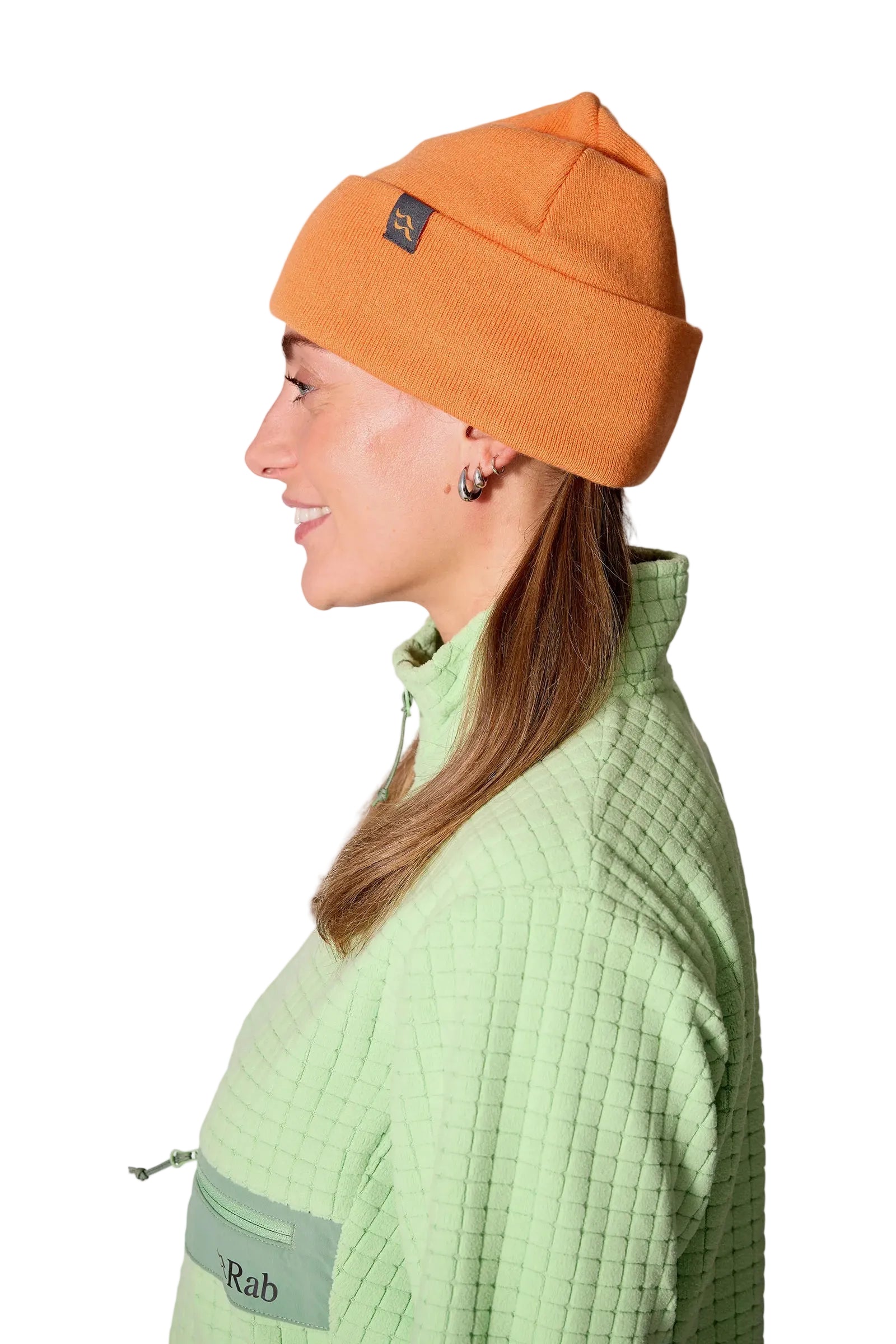 Rab Adzuki Beanie in Melba - side, styling reference