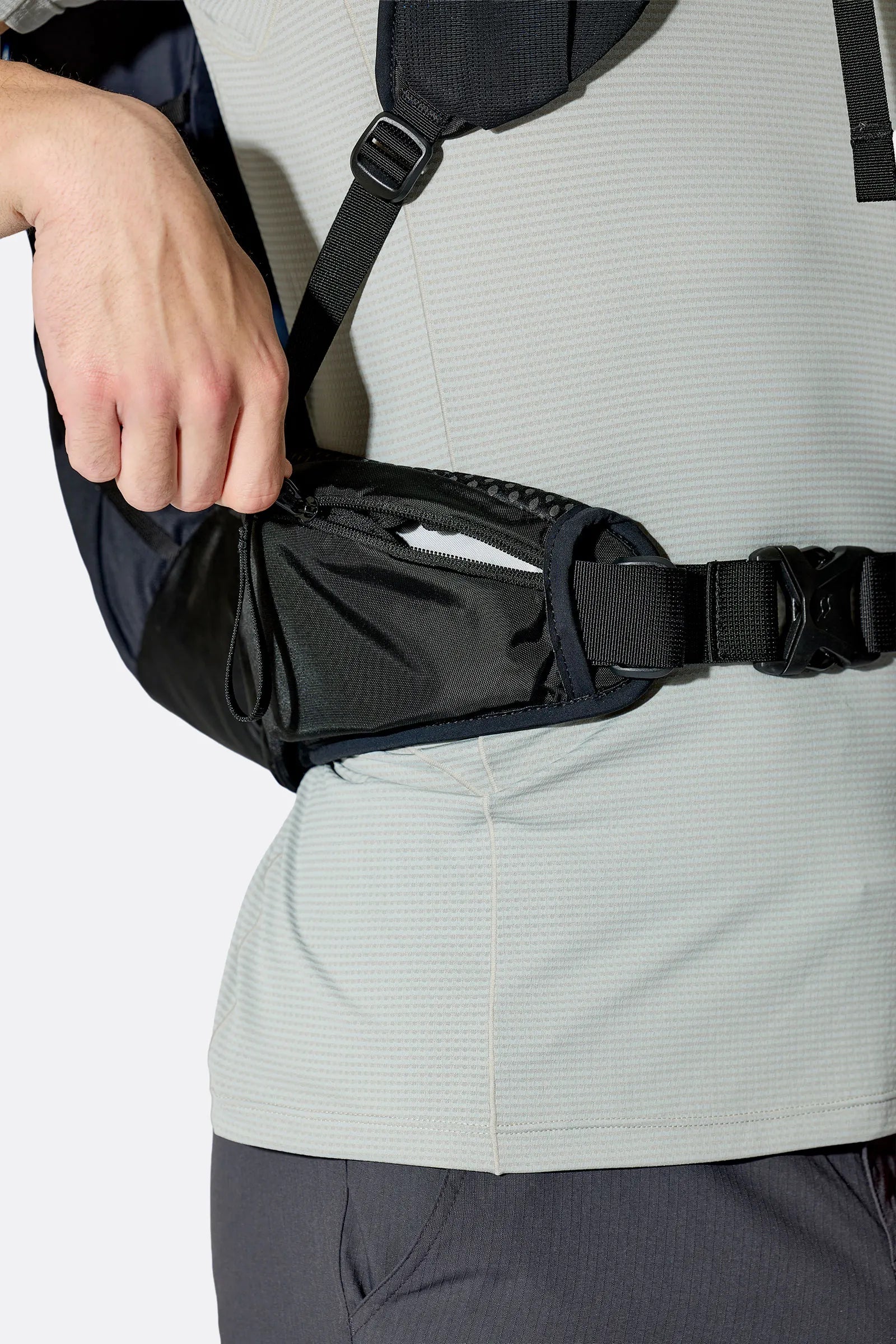 Rab Airox 30 Day Pack in Maya Blue/Black - Side View On Model 3