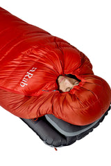Rab Alpine Down Sleeping Bag (0°C/32F) in Dark Horizon/Tuscan Red - hood detail, worn